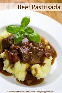 Beef, braising steak, braised, lean and fat