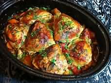 Chicken, thighs, casseroled, meat and skin, weighed with bone