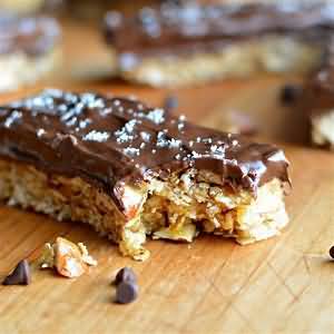 Chocolate covered bar with caramel and cereal