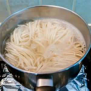 Noodles, egg, medium, dried, boiled in unsalted water