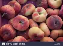 Peaches, flesh and skin, raw, weighed with stone