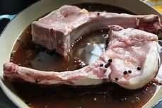 Pork, spare rib chops, braised, lean and fat, weighed with bone