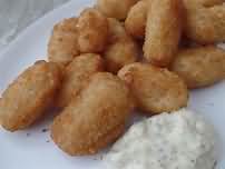 Scampi, coated in breadcrumbs, baked