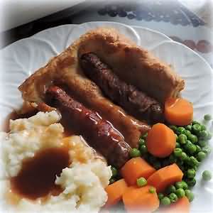 Toad in the hole, made with skimmed milk and reduced fat sausages, homemade