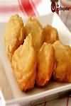 Calamari, coated in batter, baked