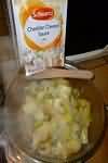 Cheese sauce, packet mix, made up with skimmed milk, homemade