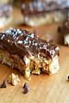 Chocolate covered bar with caramel and cereal