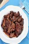 Oxtail, meat only, stewed with added salt