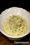 Pasta with ham and mushroom sauce, homemade