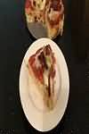 Pasta, egg, fresh, filled with cheese and tomato, boiled in unsalted water