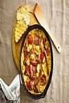 Bacon rashers, streaky, fried in corn oil