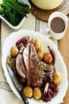 Lamb, leg, half knuckle, pot-roasted, lean