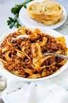Spaghetti bolognese, retail, meat and sauce only, reheated